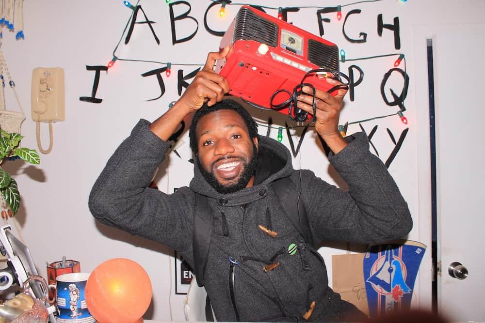 Jesse holding a red camera